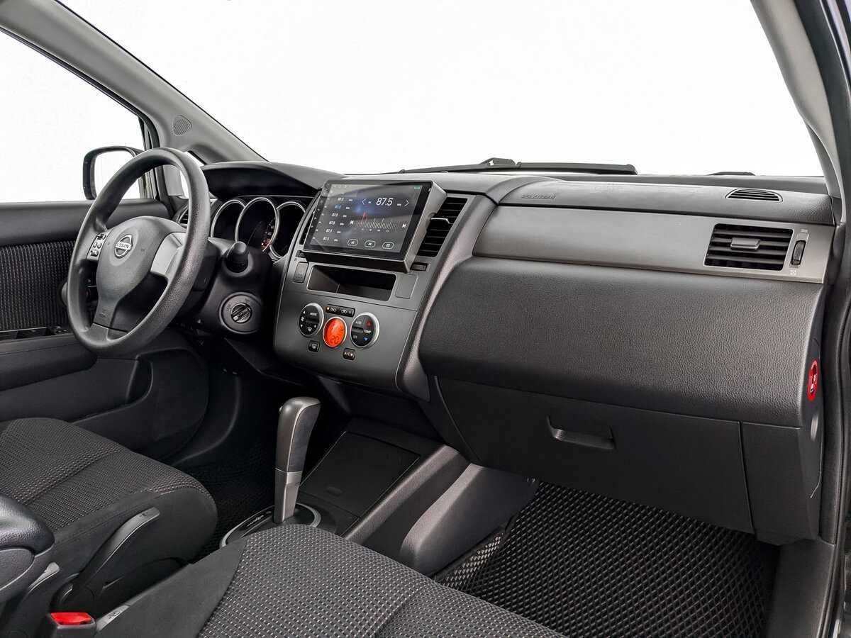 Nissan Tiida 2013 года с пробегом. Фото: #8