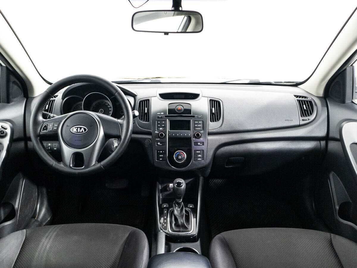 Kia Cerato 2012 года с пробегом. Фото: #12