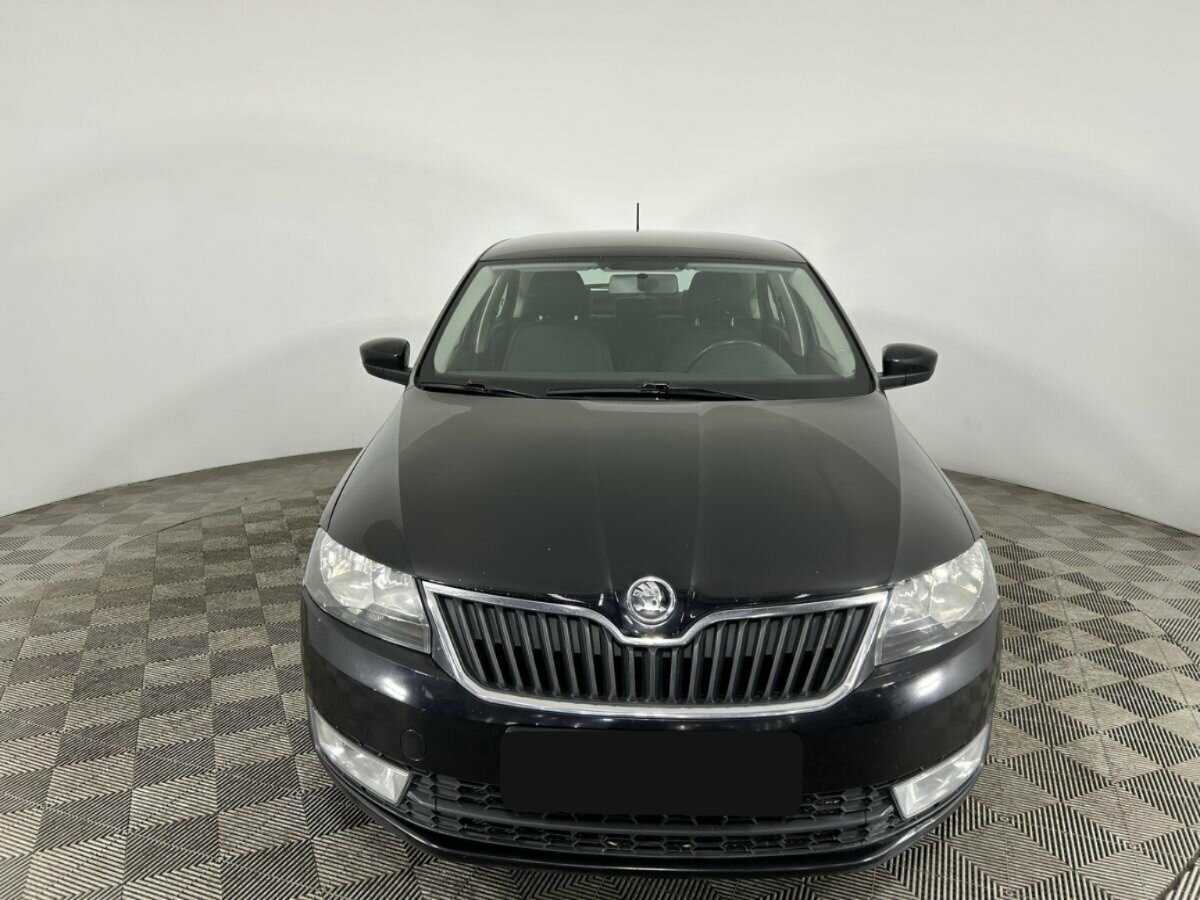 Skoda Rapid 2014 года с пробегом. Фото: #1