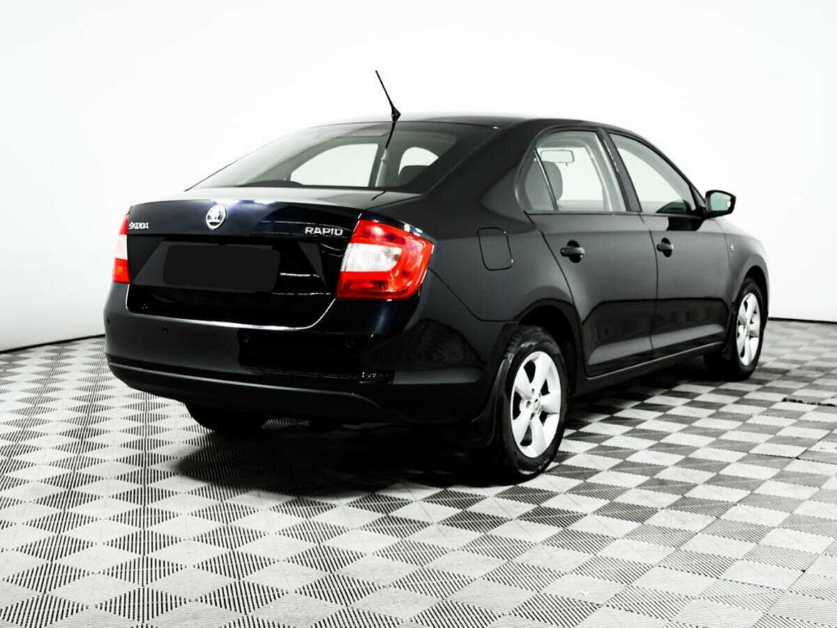 Skoda Rapid 2014 года с пробегом. Фото: #4