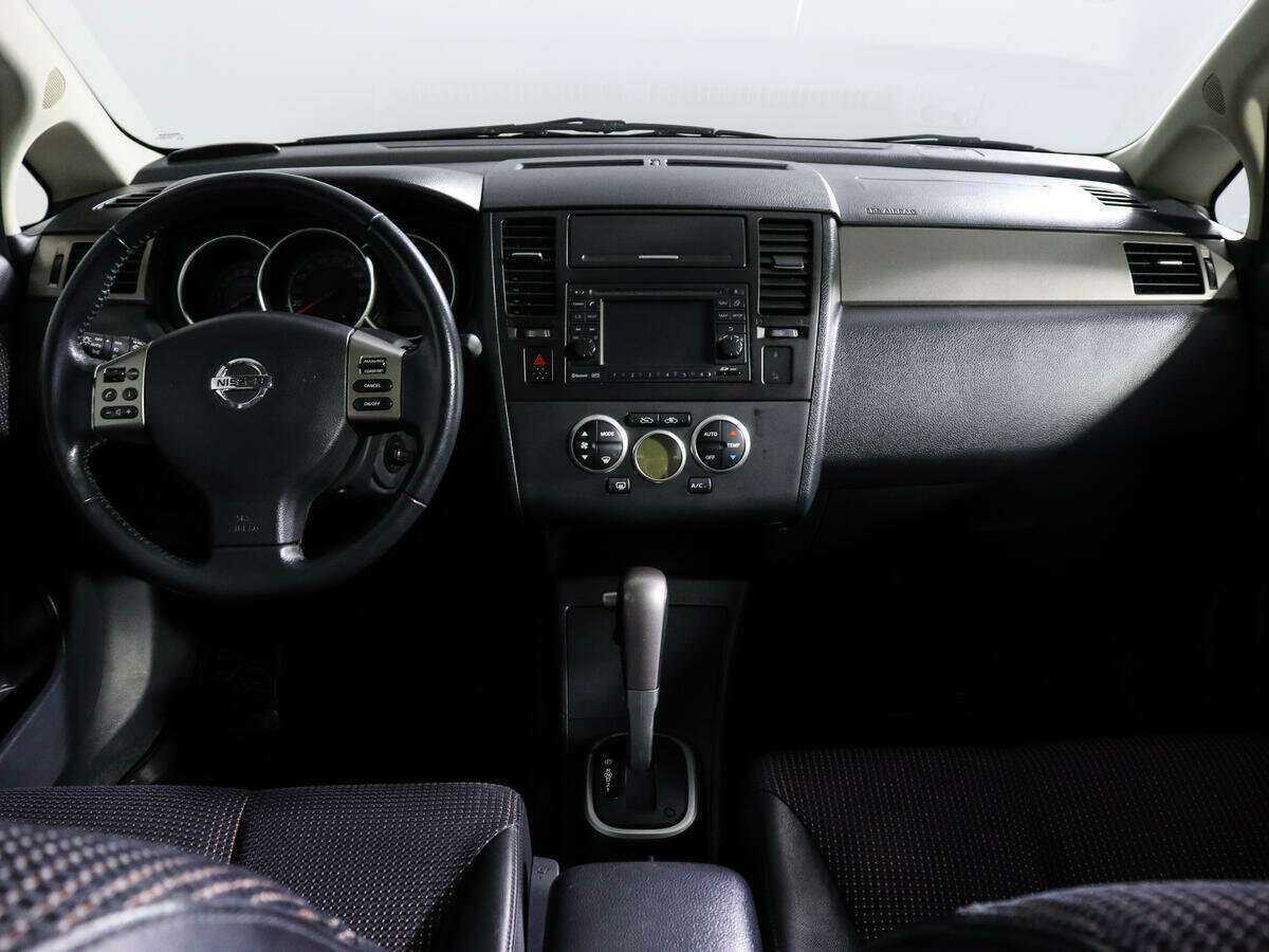 Nissan Tiida 2012 года с пробегом. Фото: #11