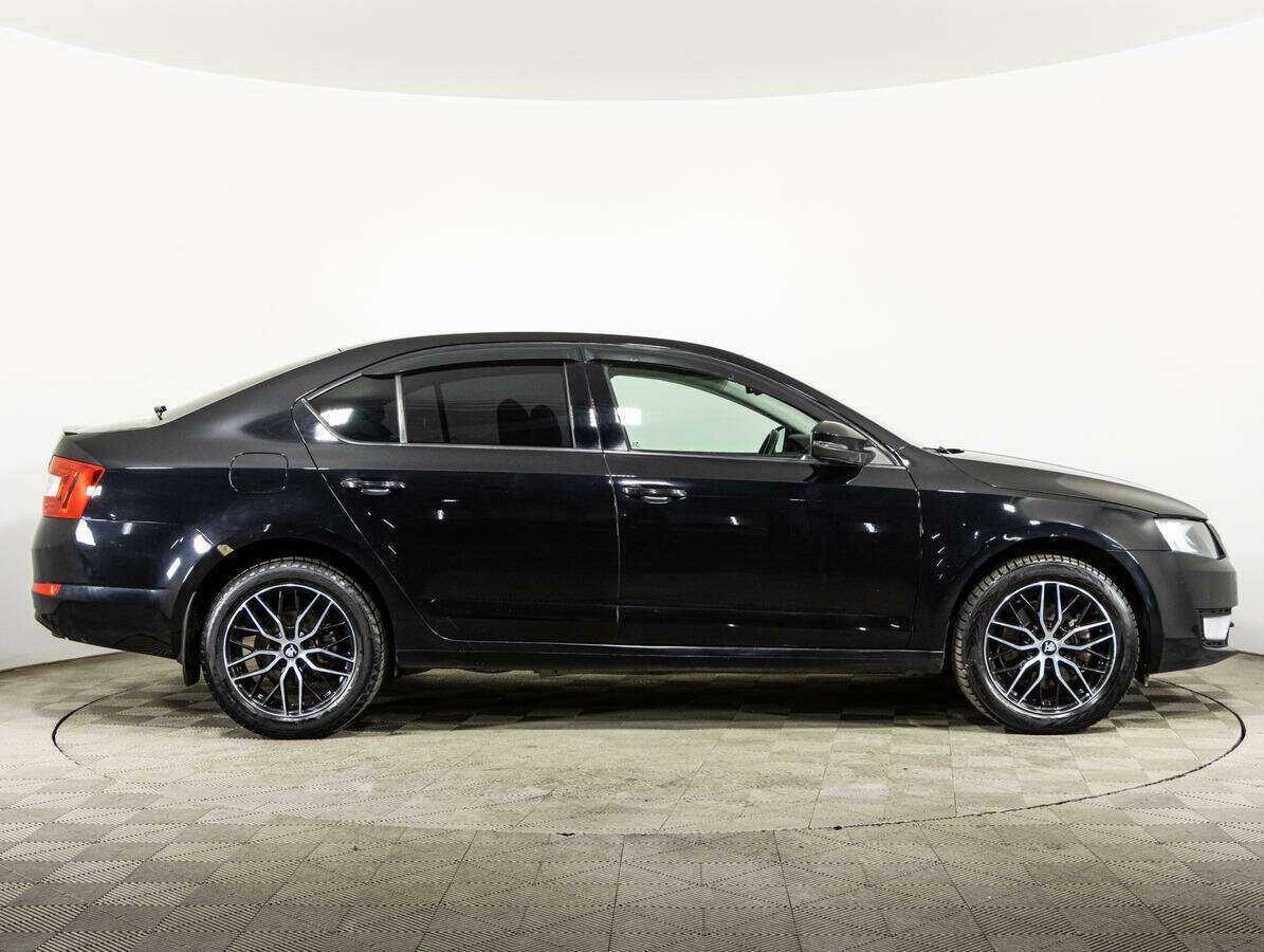 Skoda Octavia 2014 года с пробегом. Фото: #3