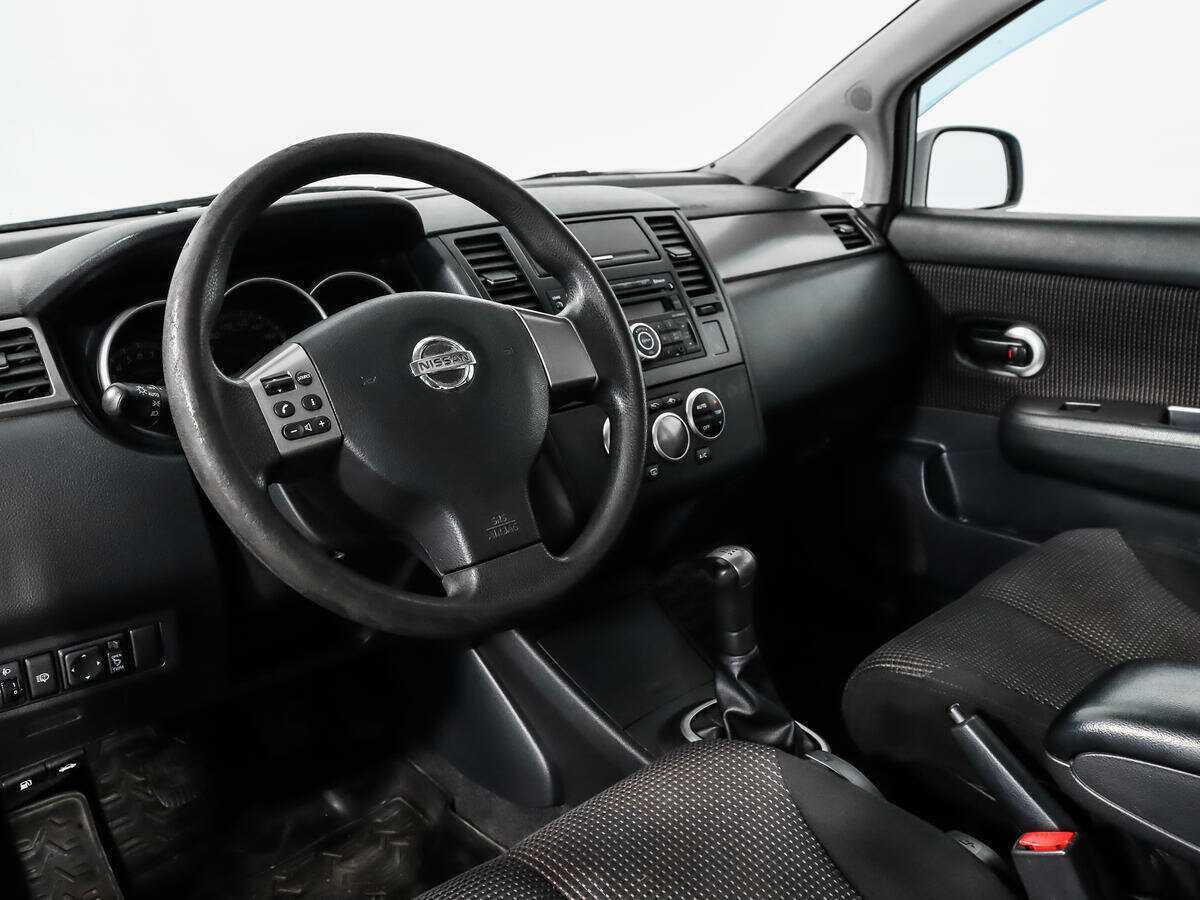Nissan Tiida 2012 года с пробегом. Фото: #8