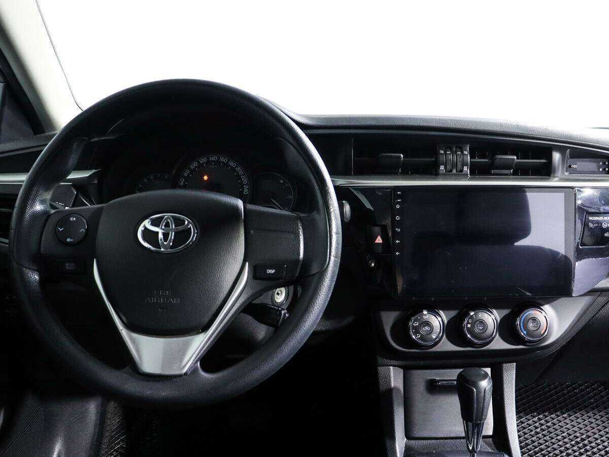 Toyota Corolla 2013 года с пробегом. Фото: #8