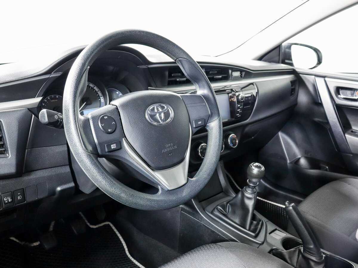 Toyota Corolla 2014 года с пробегом. Фото: #13