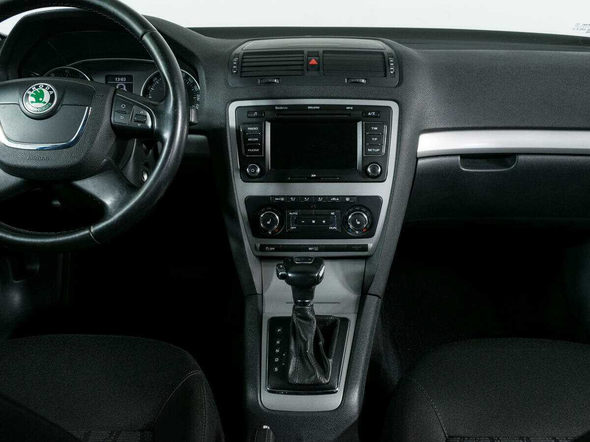 Skoda Octavia 2012 года с пробегом. Фото: #9