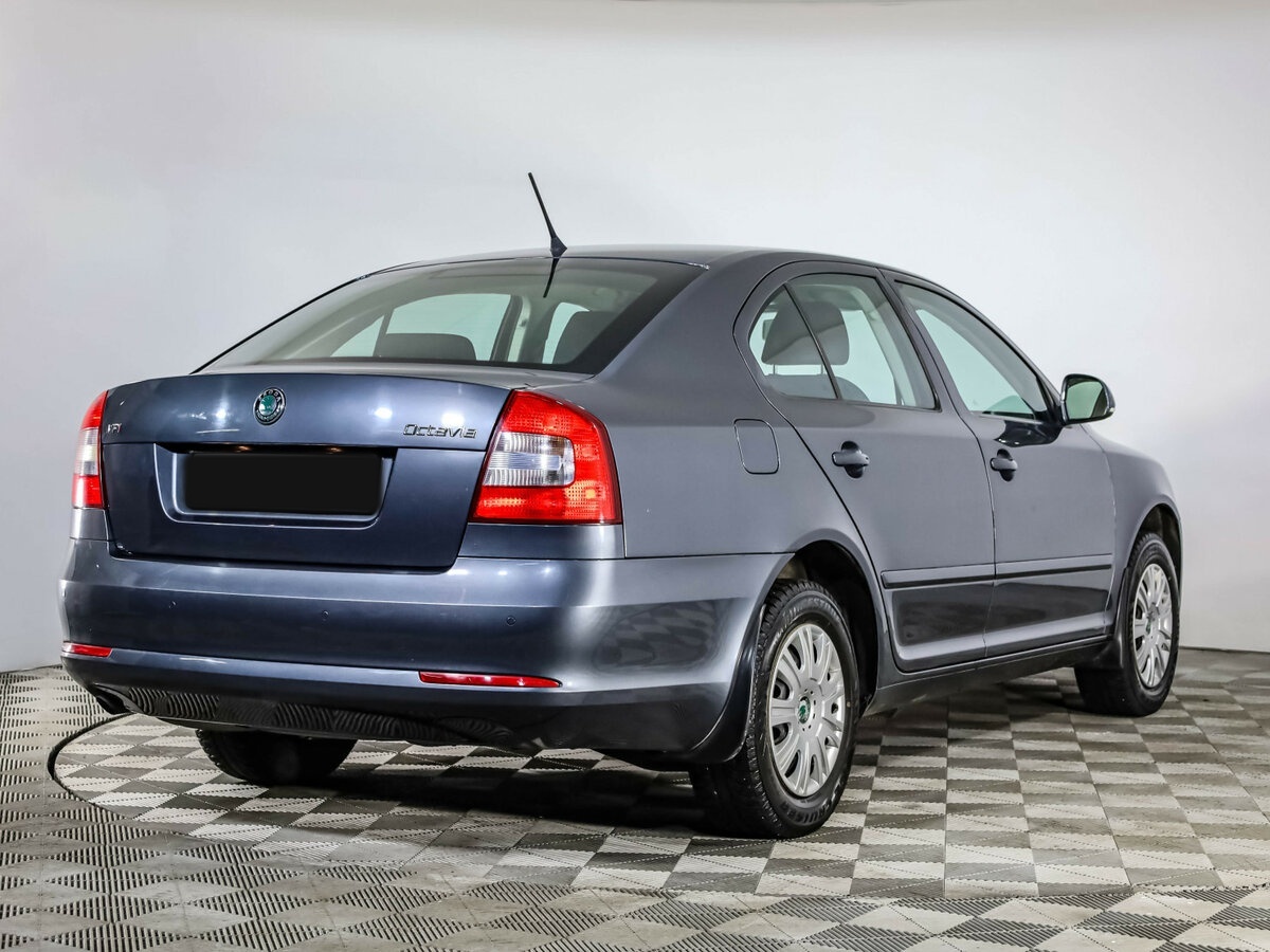 Skoda Octavia 2012 года с пробегом. Фото: #3