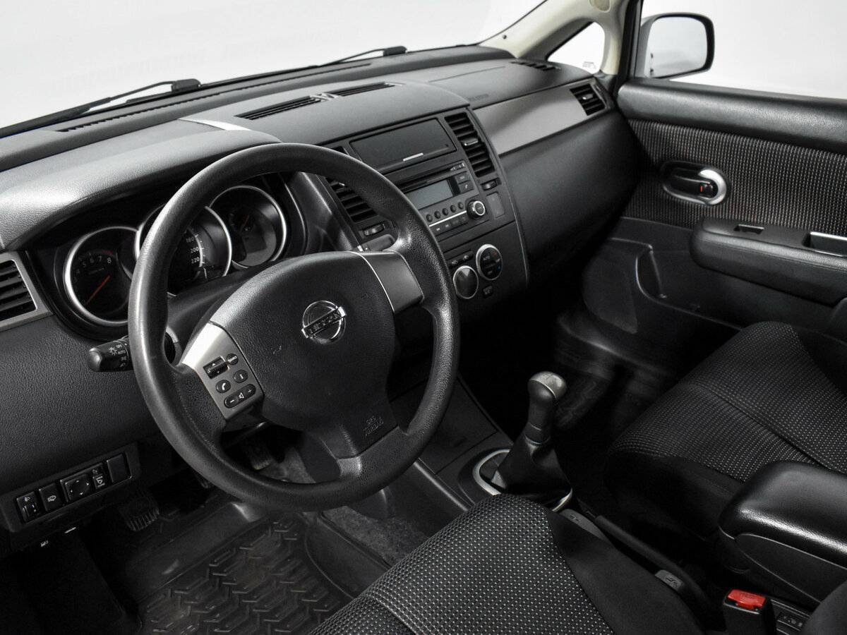 Nissan Tiida 2013 года с пробегом. Фото: #8