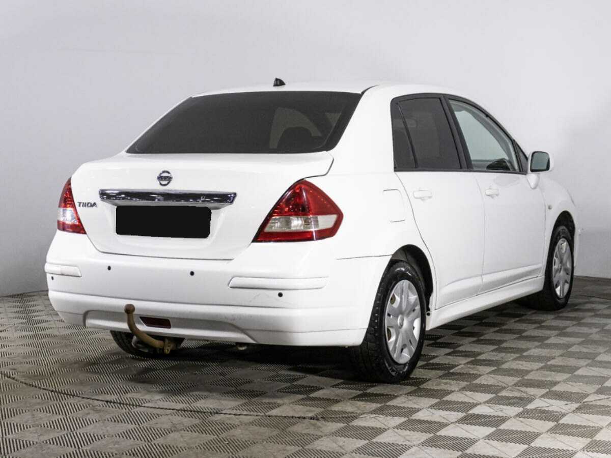 Nissan Tiida 2013 года с пробегом. Фото: #4