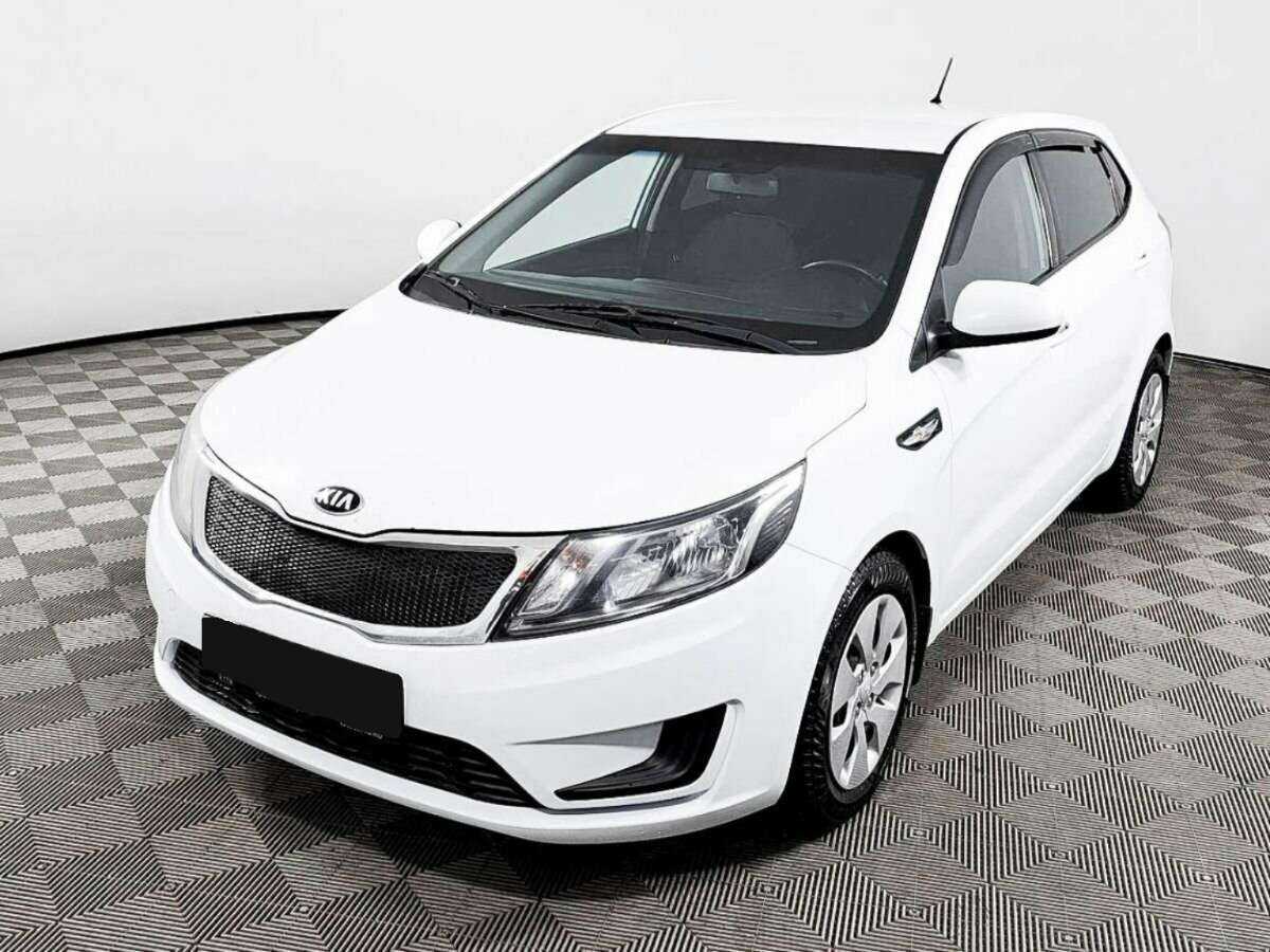 Kia Rio 2014 года с пробегом. Посмотреть фото