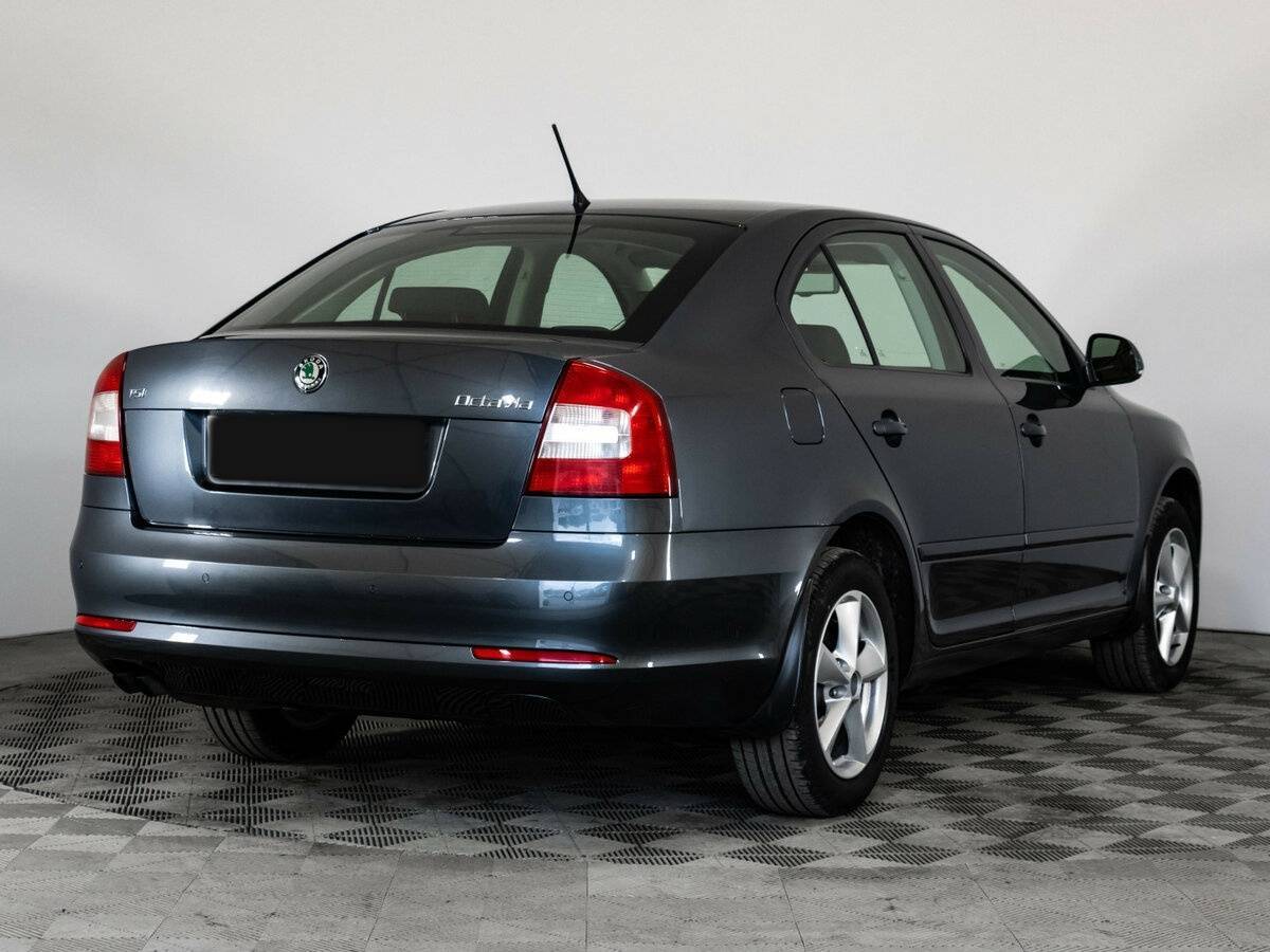 Skoda Octavia 2012 года с пробегом. Фото: #3