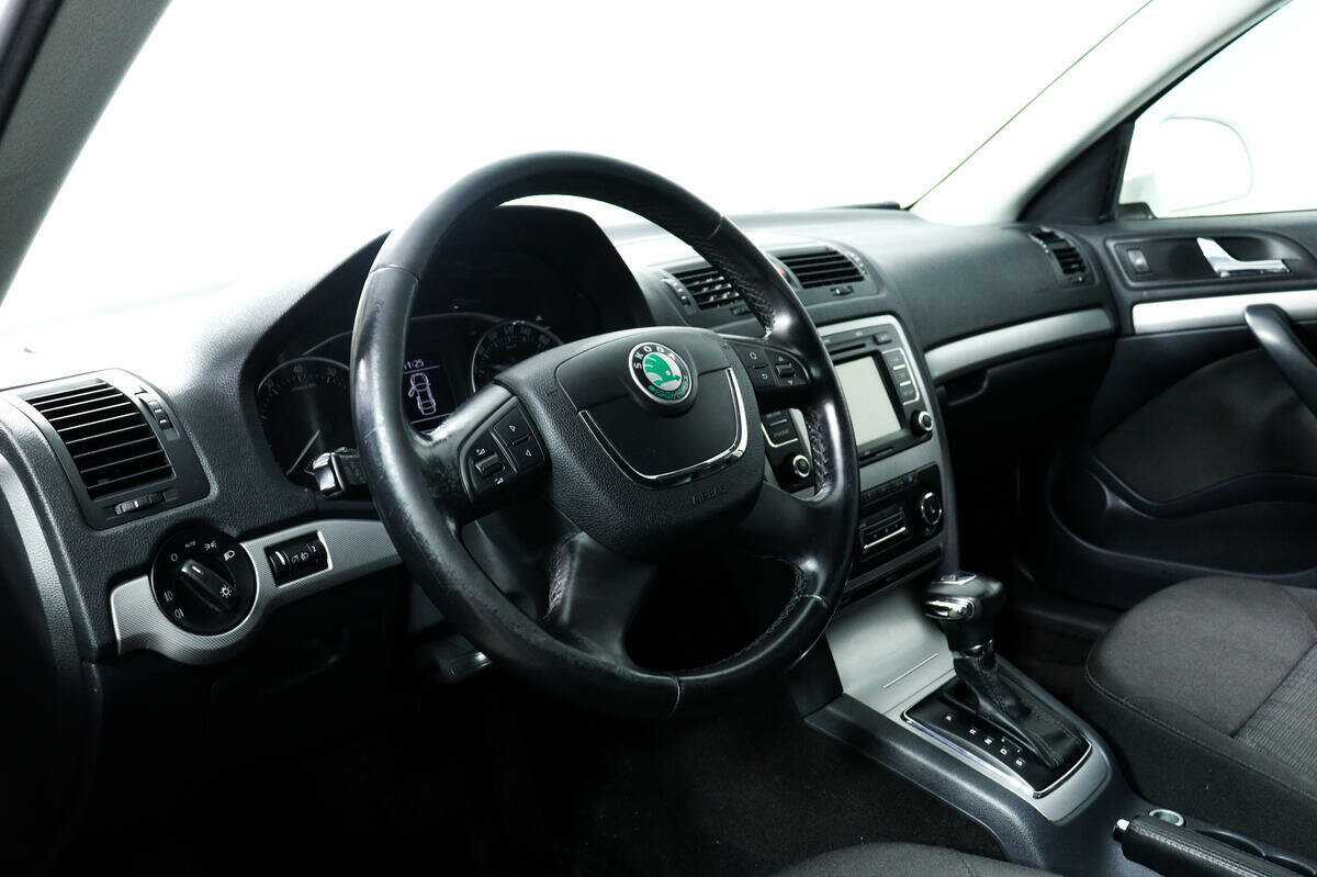 Skoda Octavia 2012 года с пробегом. Фото: #11
