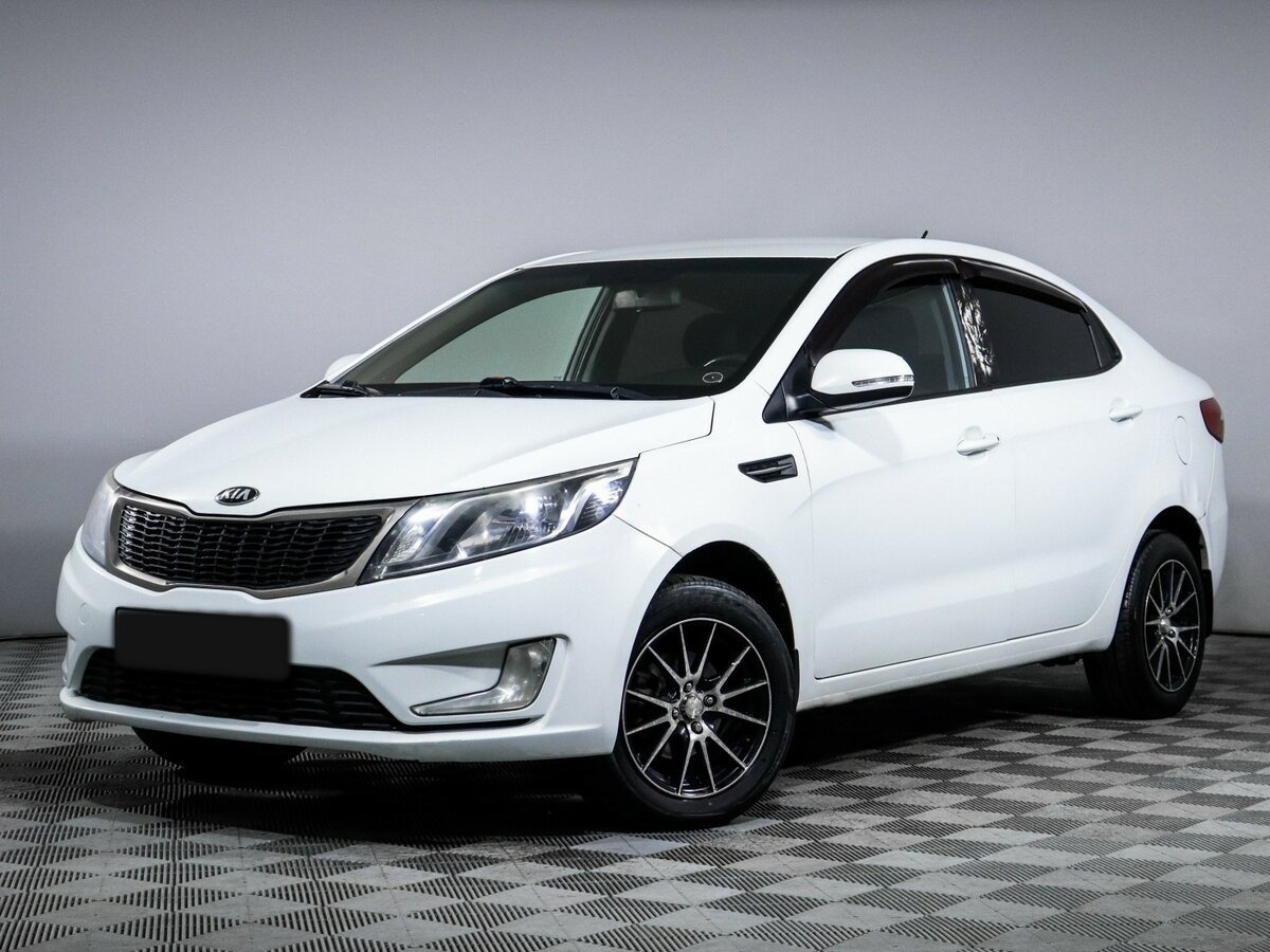 Kia Rio 2013 года с пробегом. Посмотреть фото