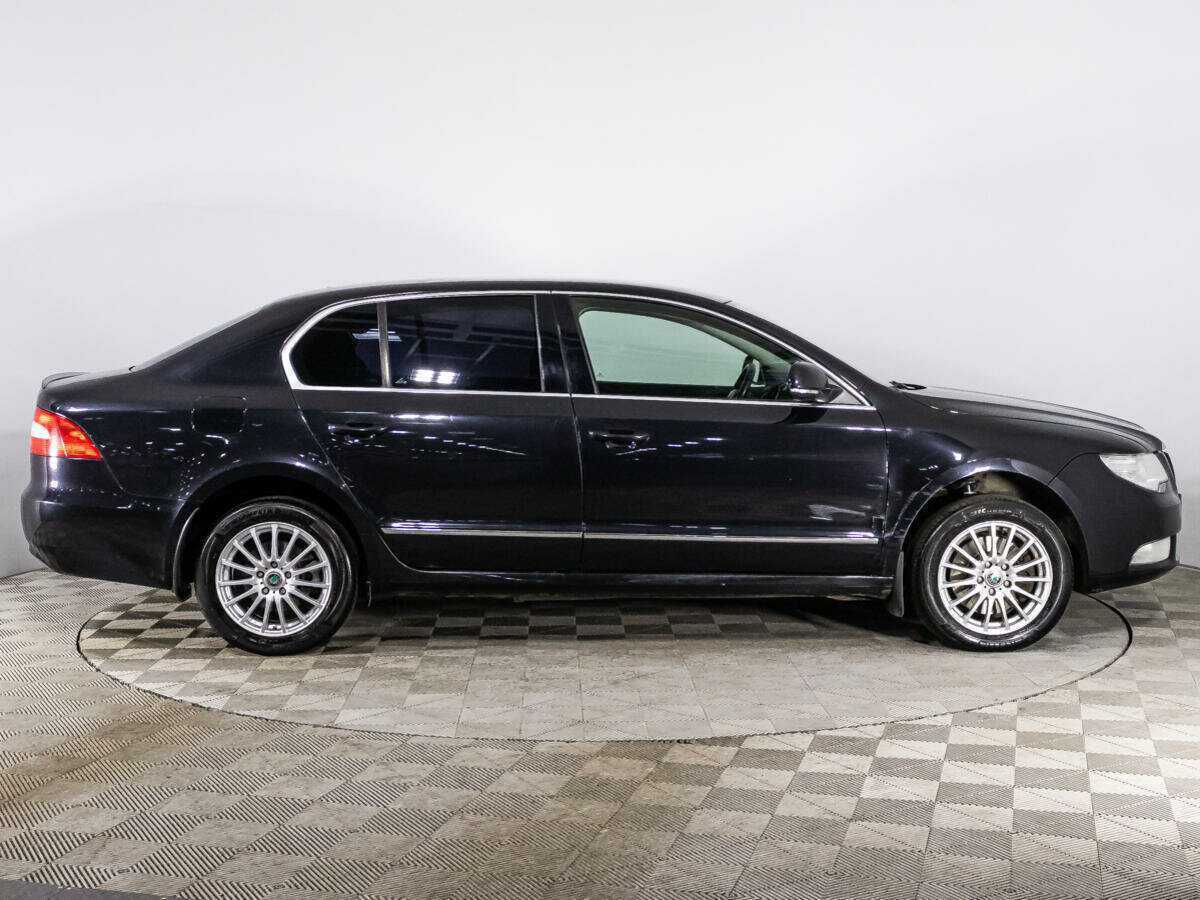 Skoda Superb 2012 года с пробегом. Фото: #3