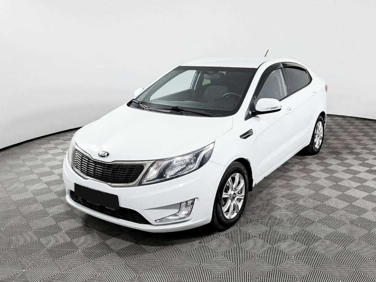 Kia Rio 2013 года с пробегом. Посмотреть фото