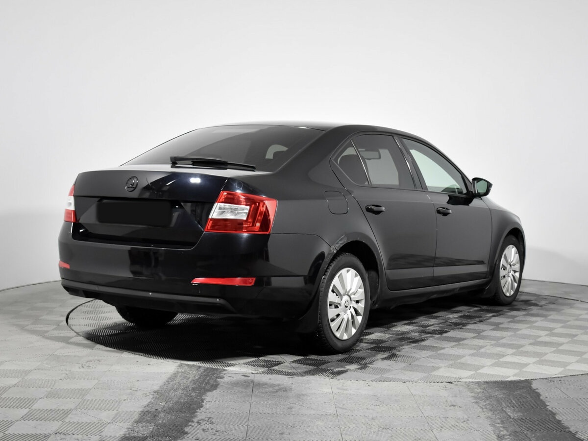 Skoda Octavia 2014 года с пробегом. Фото: #4