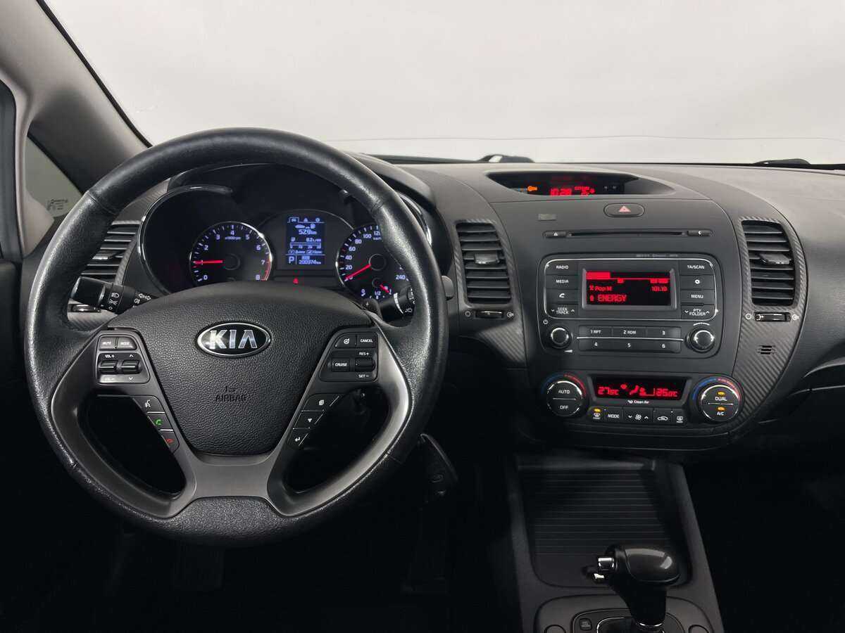 Kia Cerato 2014 года с пробегом. Фото: #9
