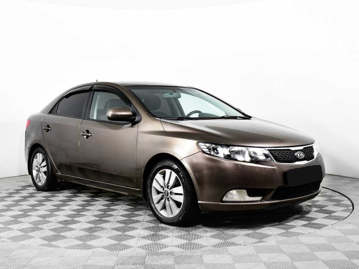 Kia Cerato 2012 года с пробегом. Фото: #2
