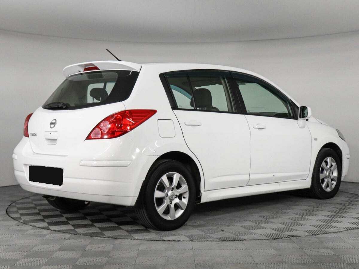 Nissan Tiida 2013 года с пробегом. Фото: #4