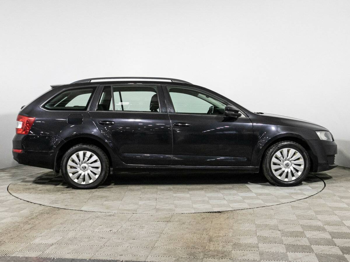 Skoda Octavia 2014 года с пробегом. Фото: #3