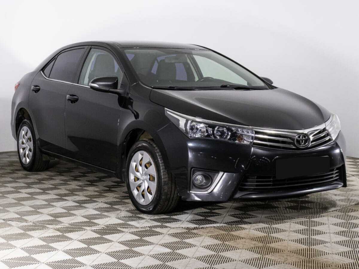 Toyota Corolla 2013 года с пробегом. Фото: #2
