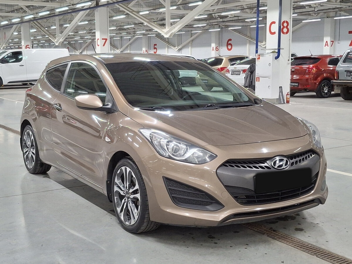 Hyundai i30 2013 года с пробегом. Фото: #2