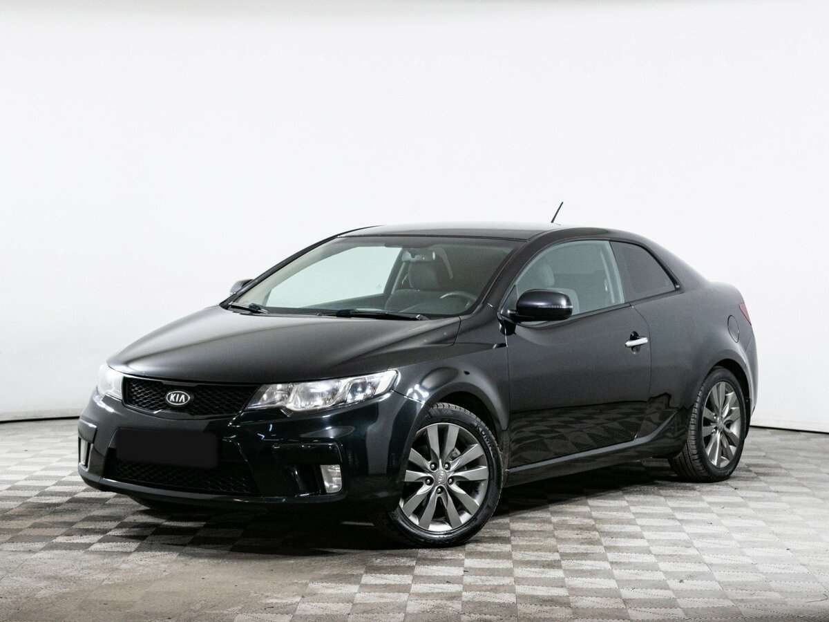 Kia Cerato 2012 года с пробегом. Посмотреть фото