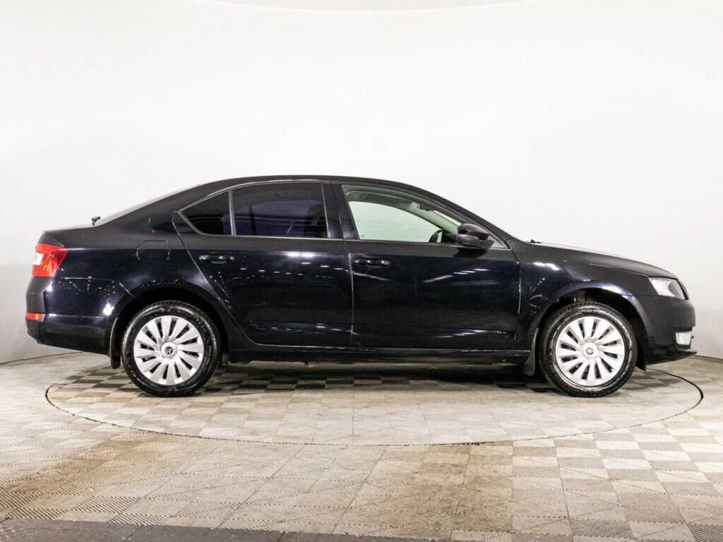 Skoda Octavia 2013 года с пробегом. Фото: #3
