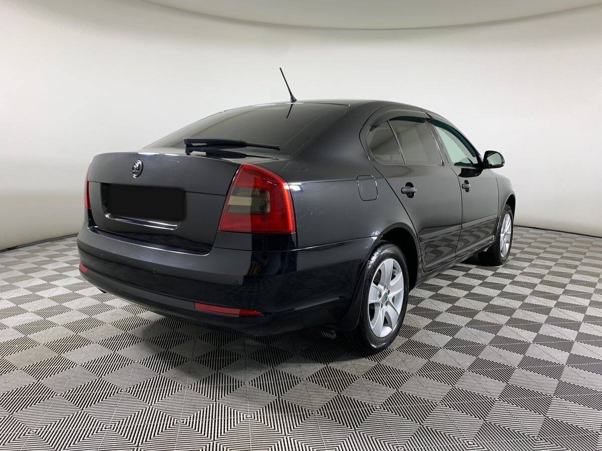 Skoda Octavia 2012 года с пробегом. Фото: #4
