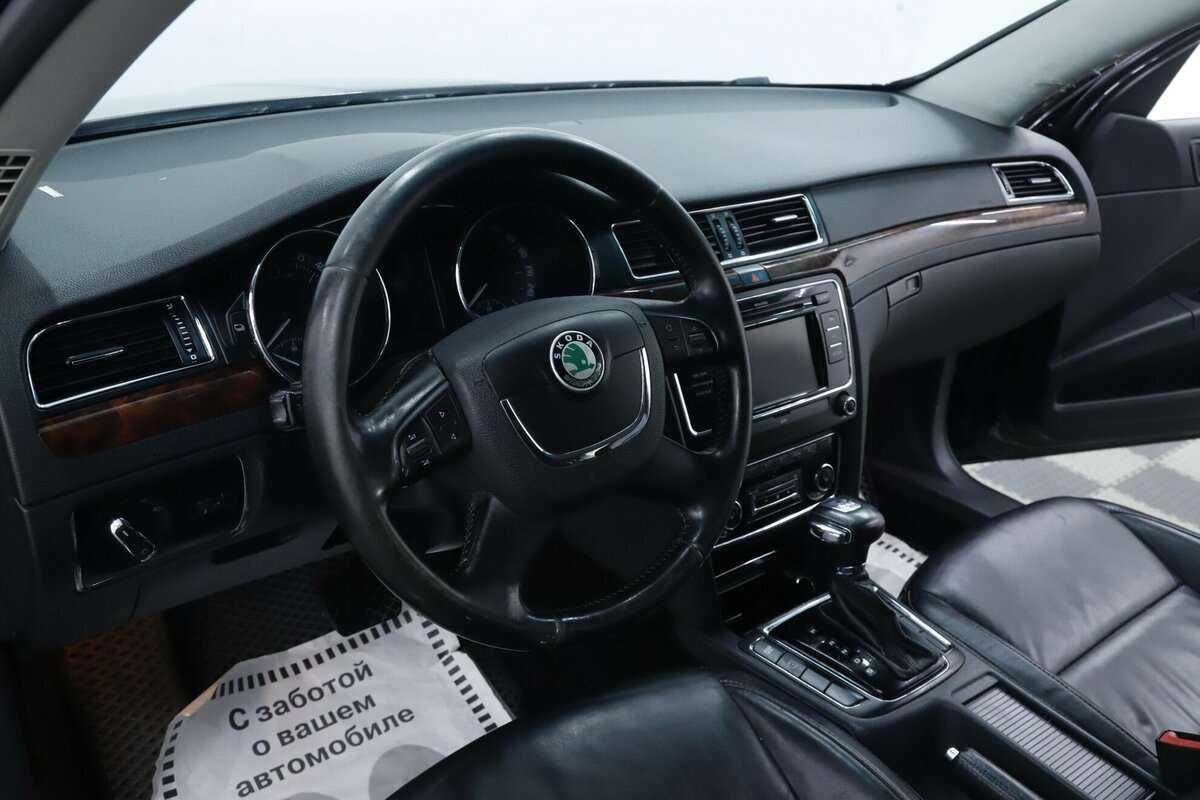Skoda Superb 2013 года с пробегом. Фото: #7