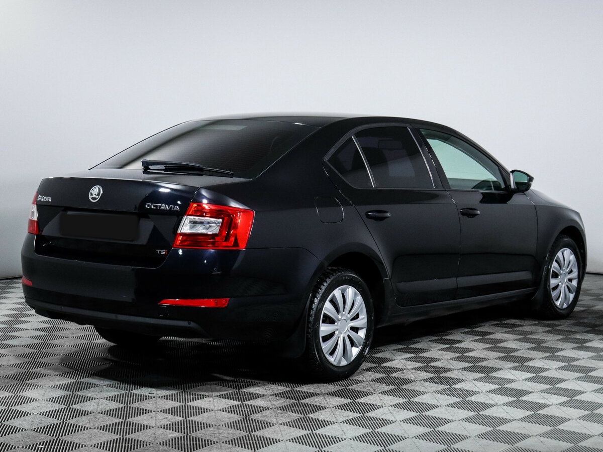 Skoda Octavia 2013 года с пробегом. Фото: #3