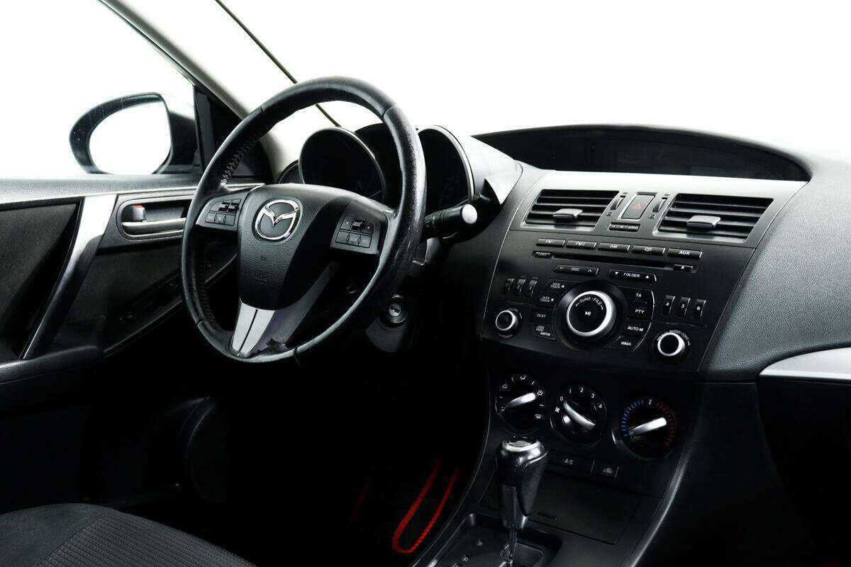 Mazda 3 2013 года с пробегом. Фото: #7