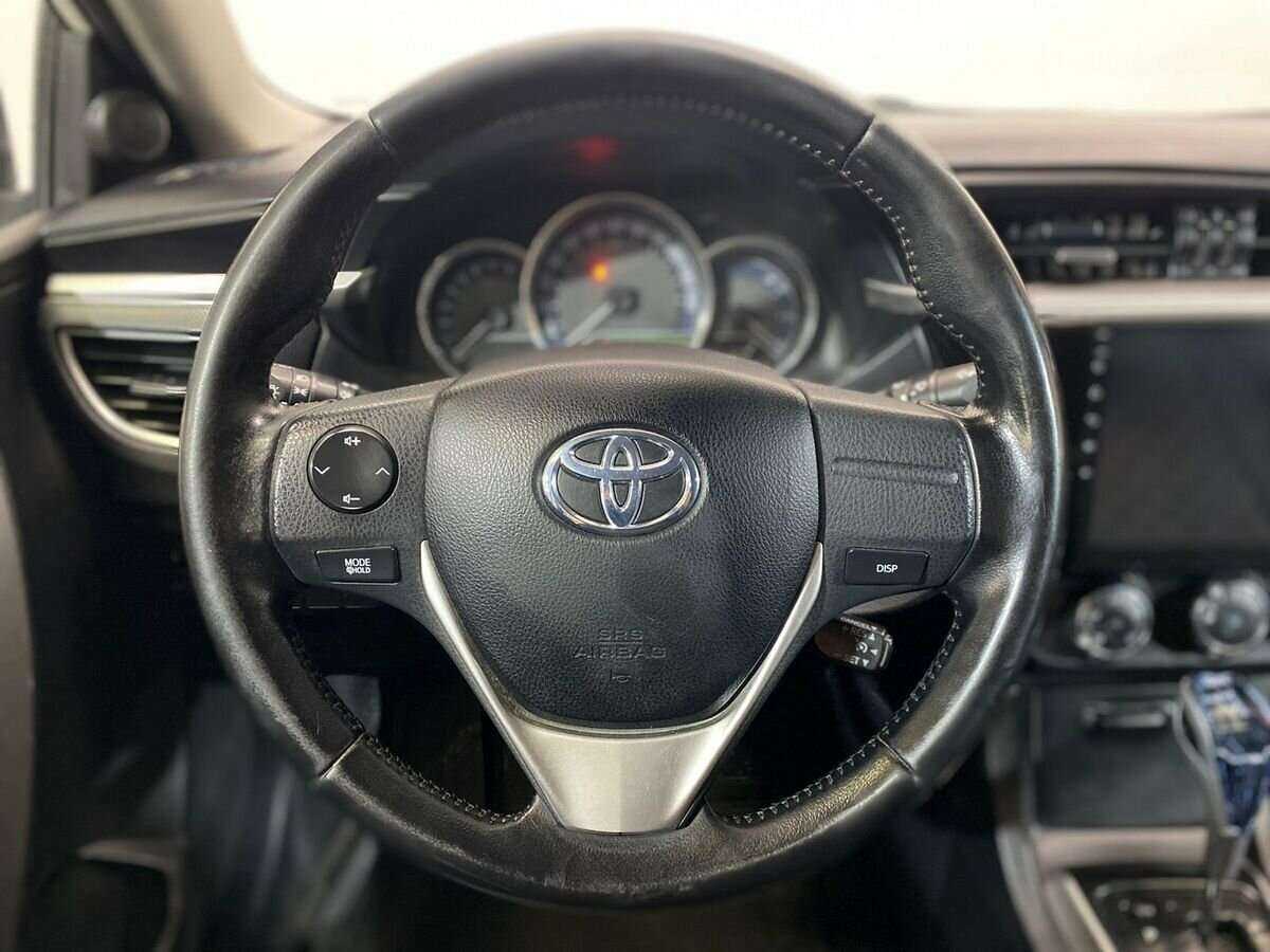 Toyota Corolla 2014 года с пробегом. Фото: #11