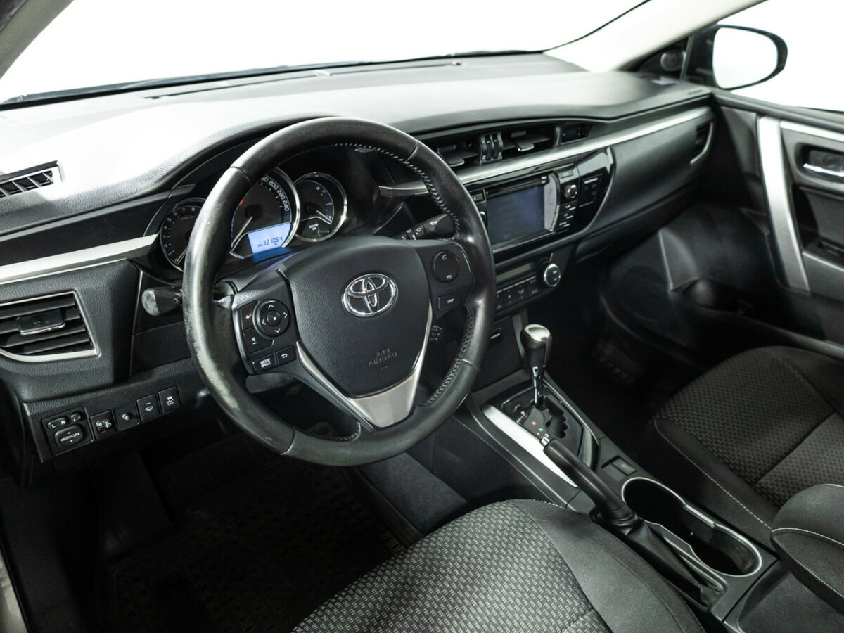 Toyota Corolla 2014 года с пробегом. Фото: #10