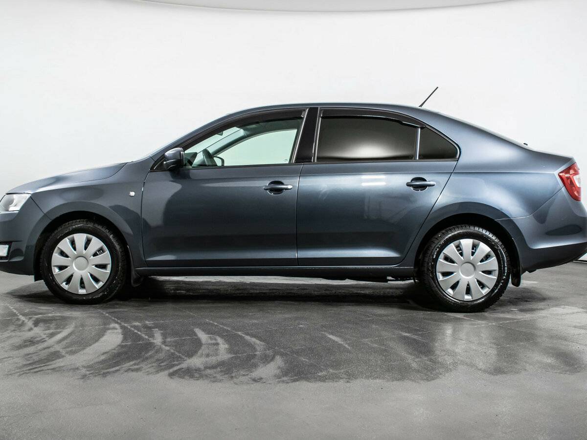 Skoda Rapid 2014 года с пробегом. Фото: #6