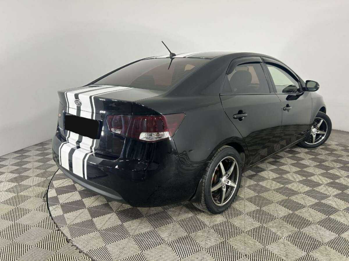 Kia Cerato 2013 года с пробегом. Фото: #3