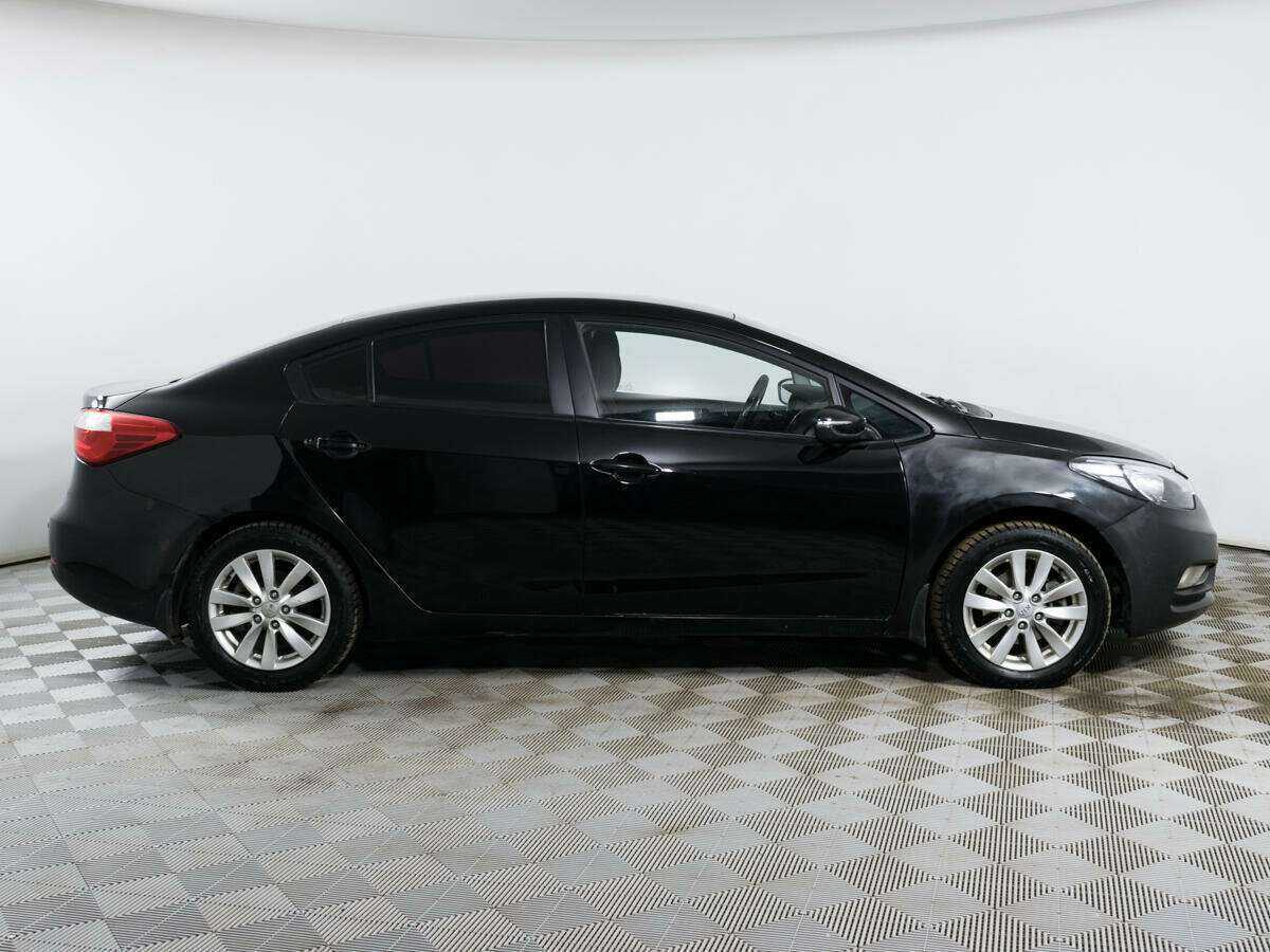 Kia Cerato 2014 года с пробегом. Фото: #3