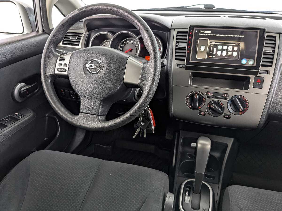 Nissan Tiida 2013 года с пробегом. Фото: #20