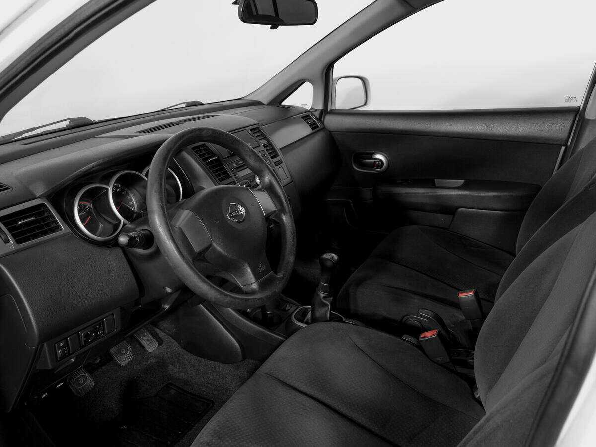 Nissan Tiida 2013 года с пробегом. Фото: #13