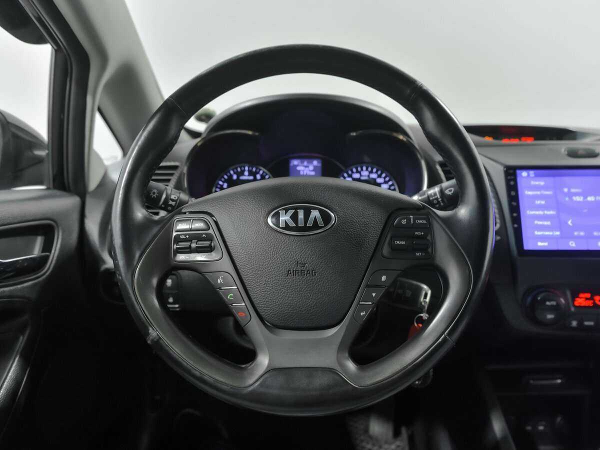 Kia Cerato 2014 года с пробегом. Фото: #6