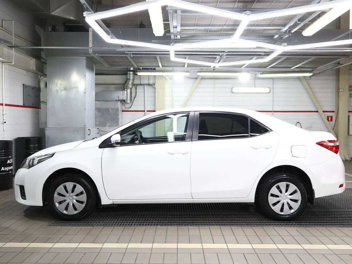 Toyota Corolla 2014 года с пробегом. Фото: #4