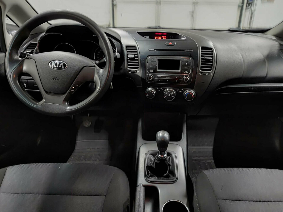 Kia Cerato 2013 года с пробегом. Фото: #13