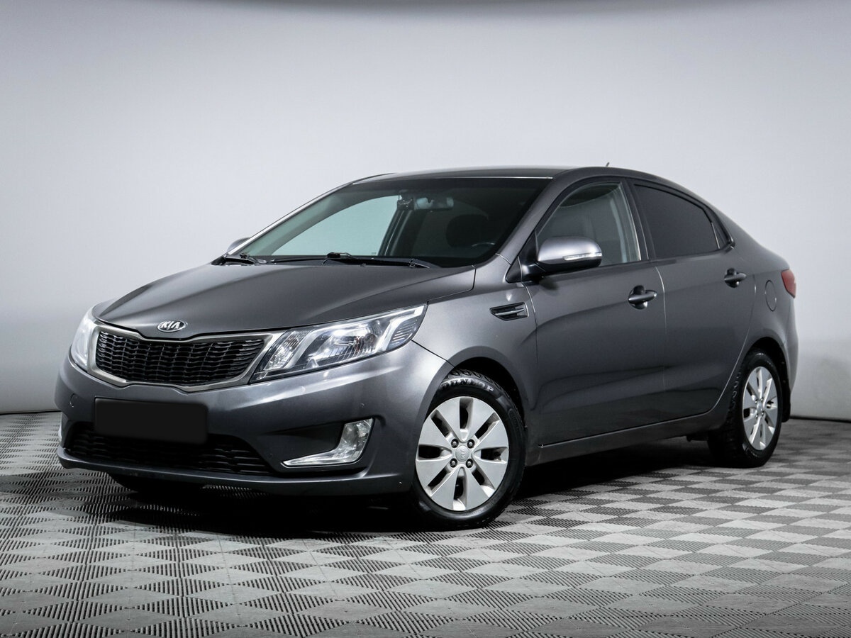 Kia Rio 2013 года с пробегом. Посмотреть фото
