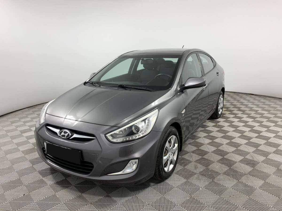 Hyundai Solaris 2013 года с пробегом. Посмотреть фото