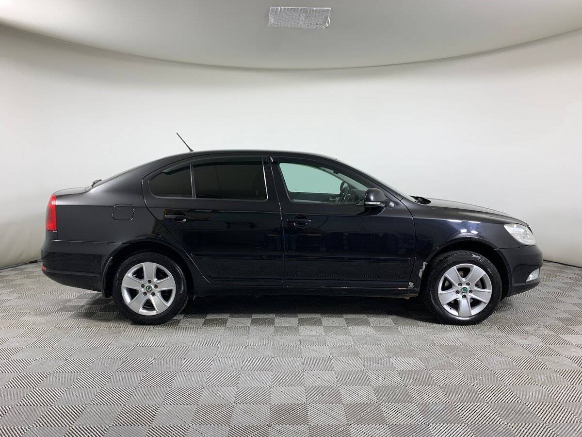 Skoda Octavia 2012 года с пробегом. Фото: #3