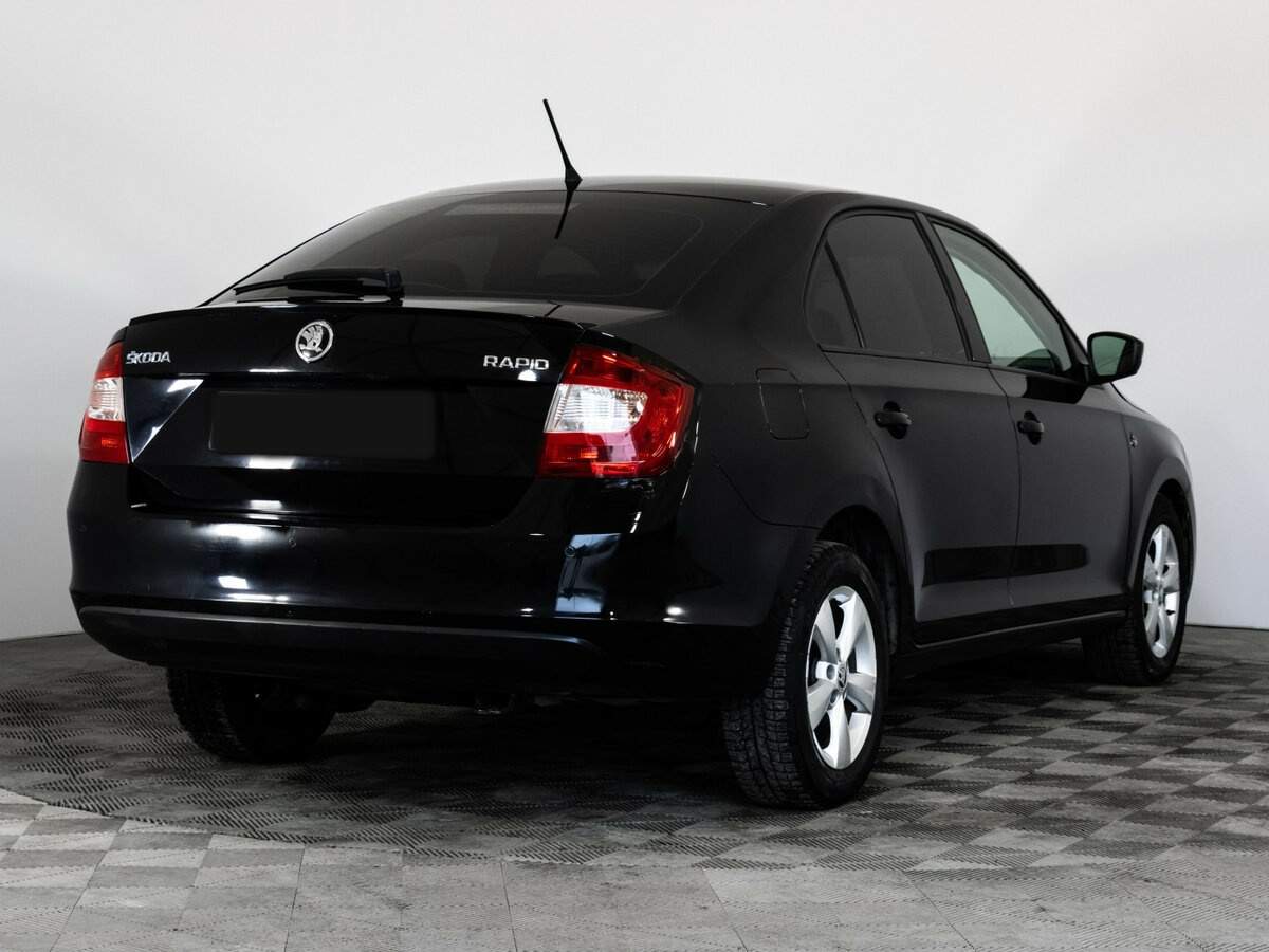 Skoda Rapid 2015 года с пробегом. Фото: #4