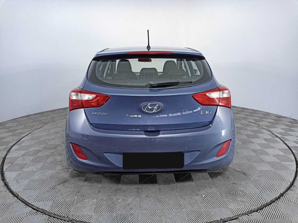 Hyundai i30 2012 года с пробегом. Фото: #5