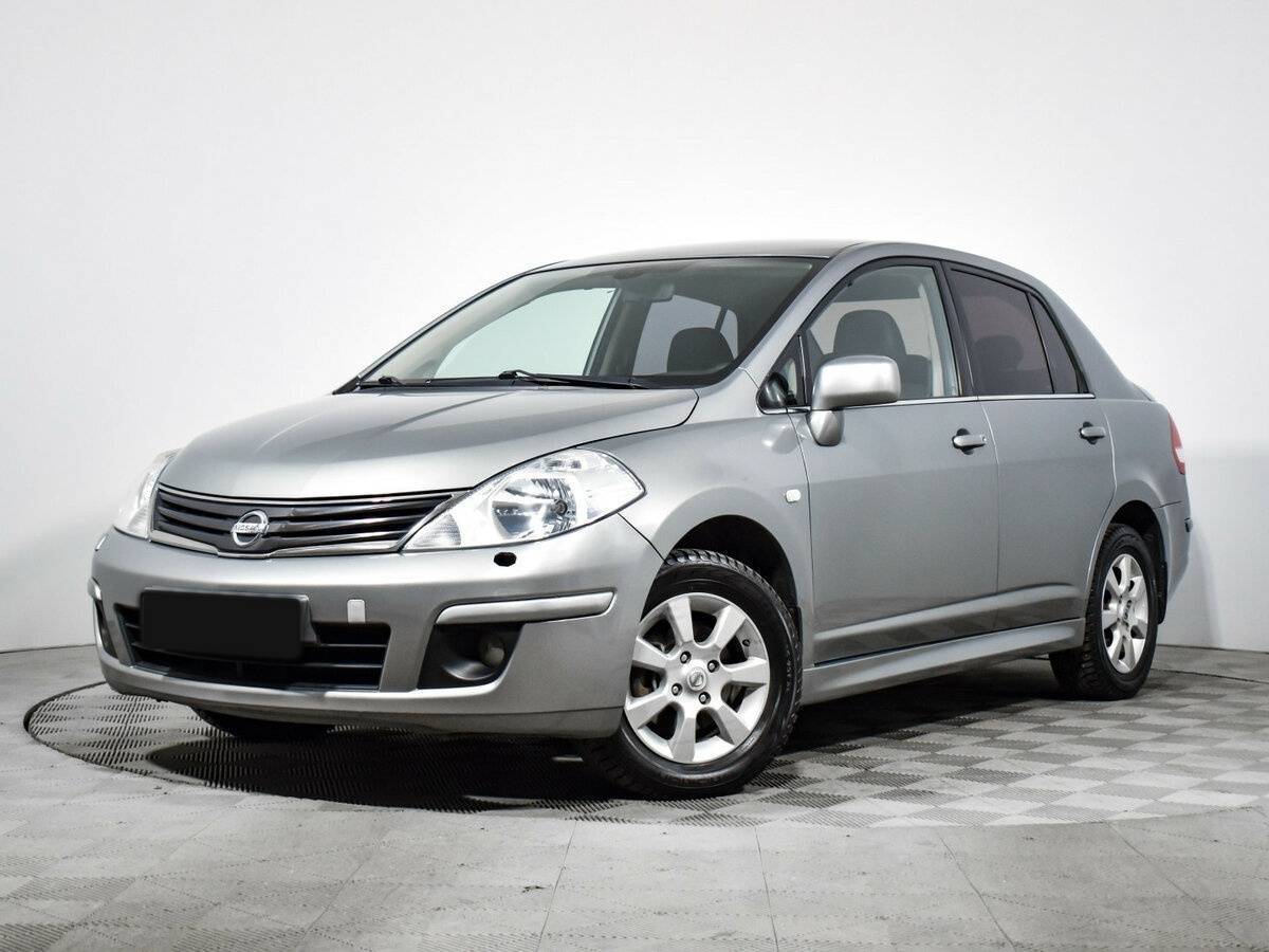 Nissan Tiida 2013 года с пробегом. Фото: #0