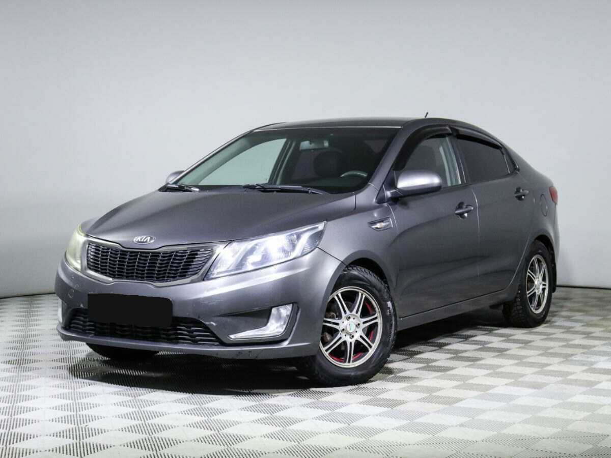 Kia Rio 2013 года с пробегом. Посмотреть фото