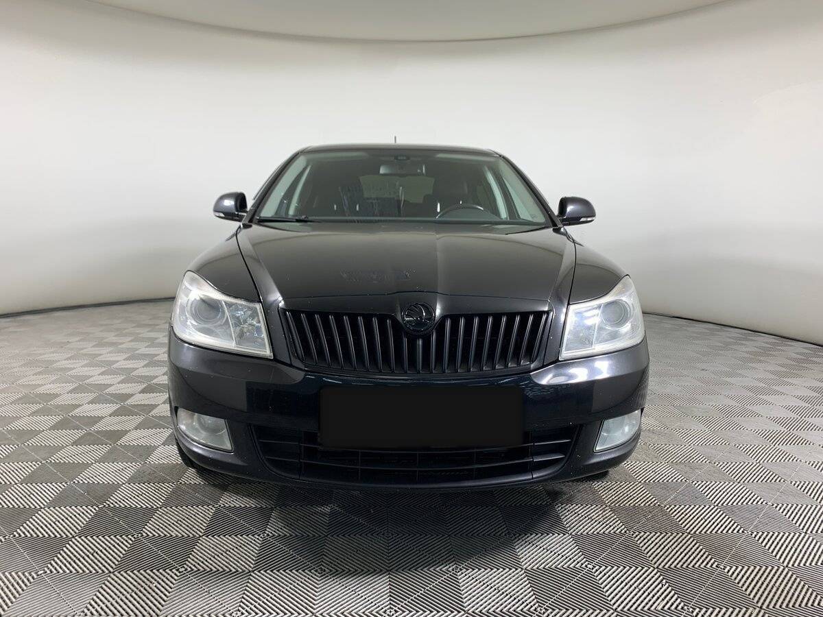 Skoda Octavia 2012 года с пробегом. Фото: #1